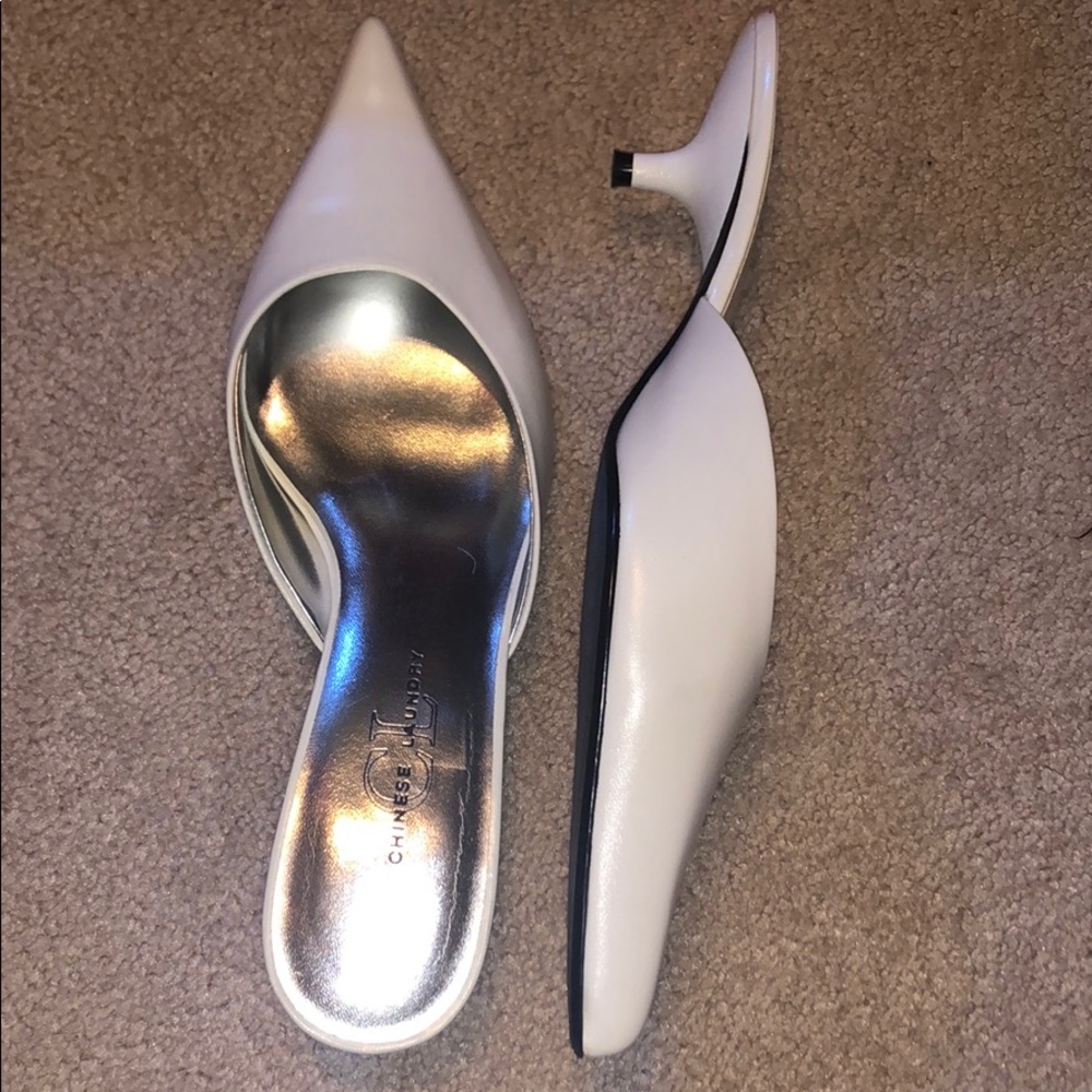 White low heel pointy toed shoes